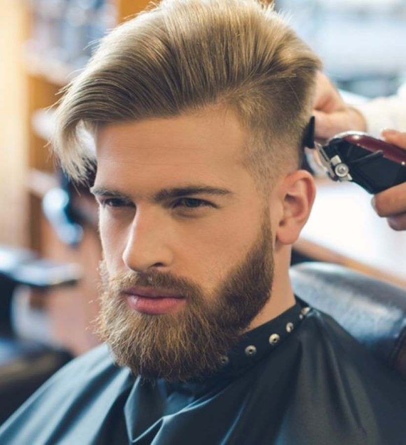 Man-getting-buzz-cut-sitting-from-barber-1024x640